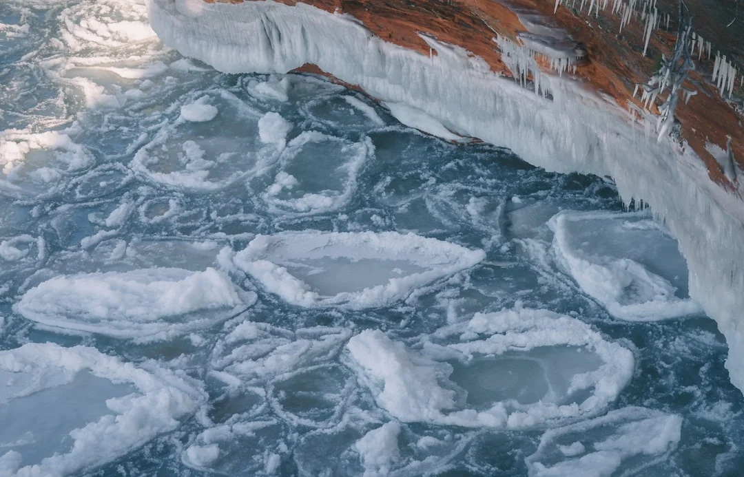 Frozen Lake Superior with white ice formations stretching to the horizon