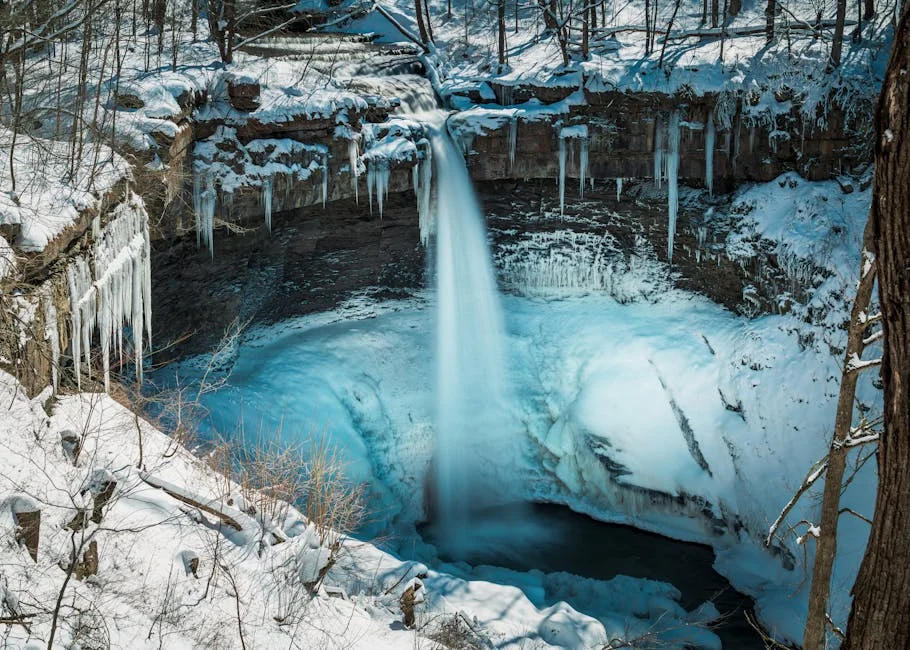 Ricketts Glen Winter Hiking: Frozen Falls Guide (2026) 8 Frozen waterfall with dramatic icicles hanging from rocky overhang