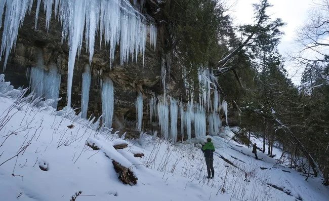Pictured Rocks Snowshoeing January: Ice Caves Guide (2026) 4 Ice curtain viewing at Pictured Rocks National Lakeshore in winter