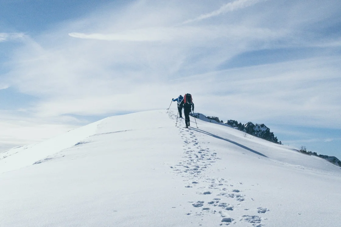 Blood Mountain winter hike - hikers ascending snow-covered summit in Georgia