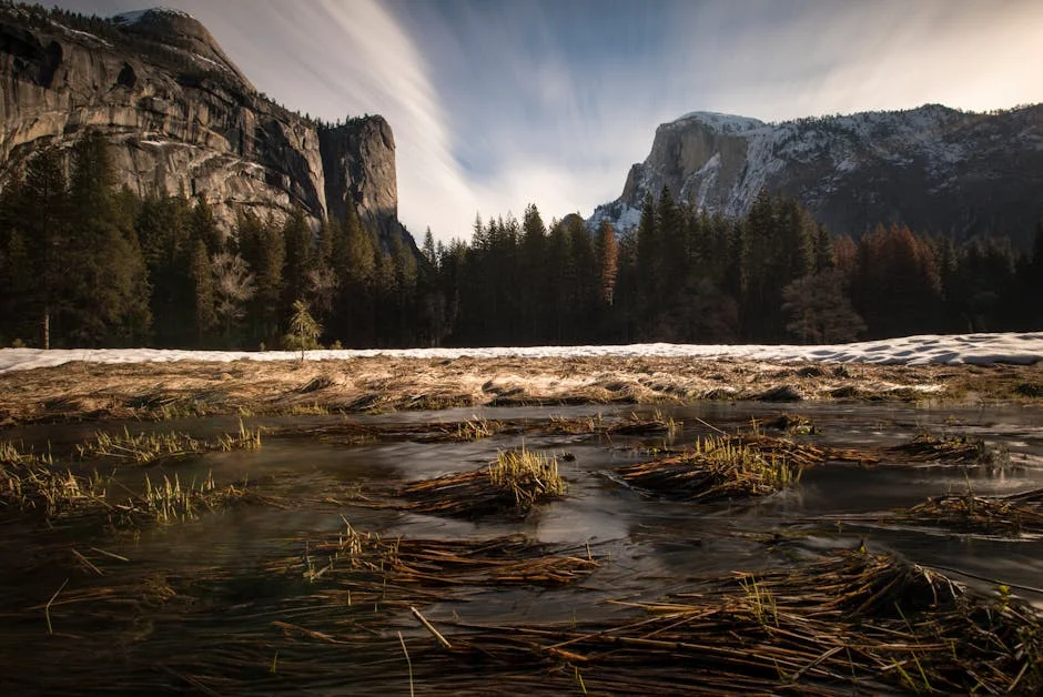 Cross country skiing Yosemite with Half Dome and snowy peaks in winter