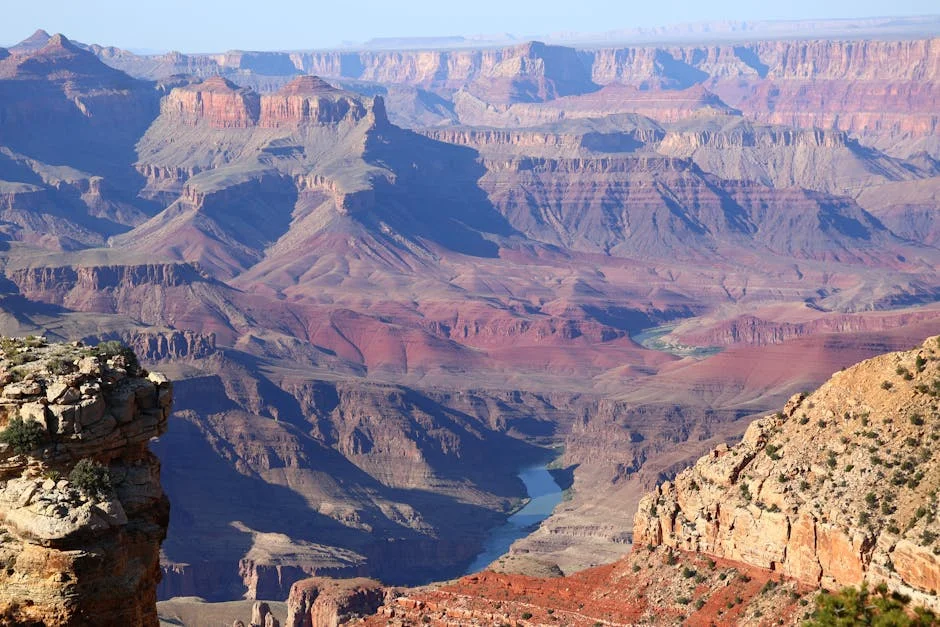 Grand Canyon layered rock formations and vast canyon panorama under overcast spring skies